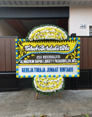 Papan Bunga Duka di Traji